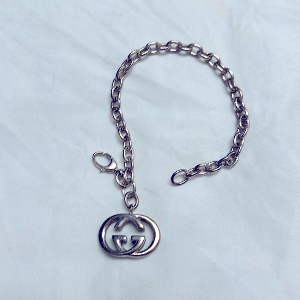 Gucci logo sterling silver charm bracelet